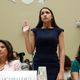 Rep. Alexandria Ocasio-Cortez (D-N.Y.) stands to be sworn in before she testifies before the House Oversight Committee hearing on family separation and detention centers, July 12, 2019, on Capitol Hill, flanked on her left by Rep. Veronica Escobar (D-Texas) and Rep. Rashida Tlaib (D-Mich.).